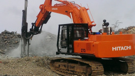 Hitachi 270 with drill rig